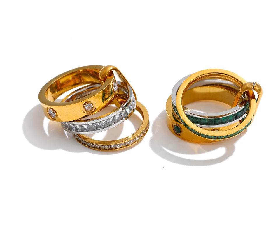 White cubic zirconia geometric ring in 18K gold-plated stainless steel with cubic zirconia.
