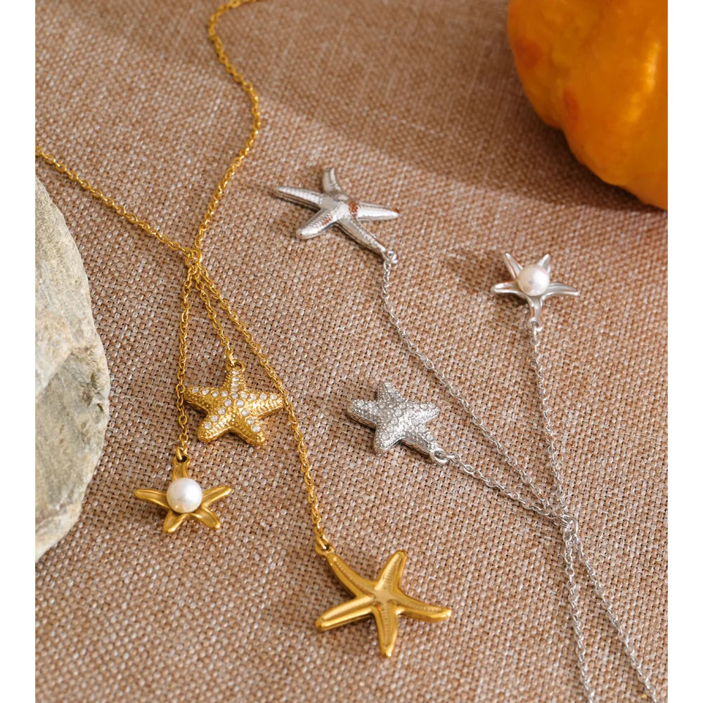 Cubic zirconia pearl shell necklace in gold-plated stainless steel with pearl and cubic zirconia.