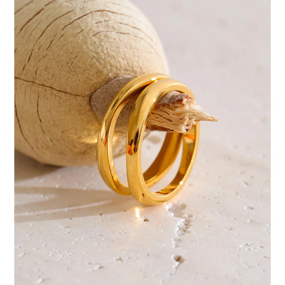 Geometric ring in 18K gold-plated stainless steel.