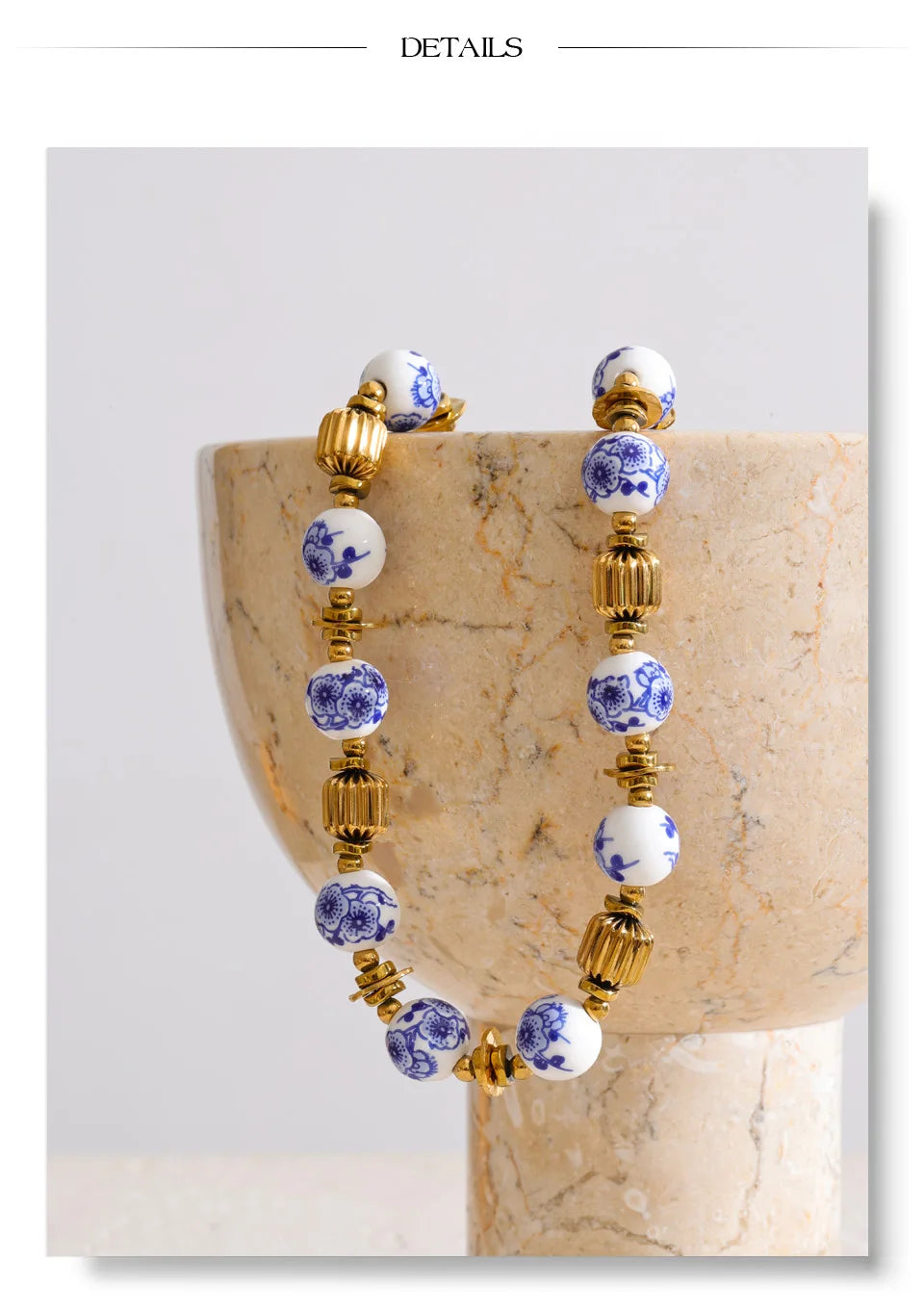 Blue flower beaded necklace in gold-plated stainless steel.