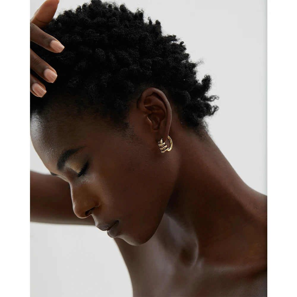 Geometric earrings in gold-plated stainless steel.