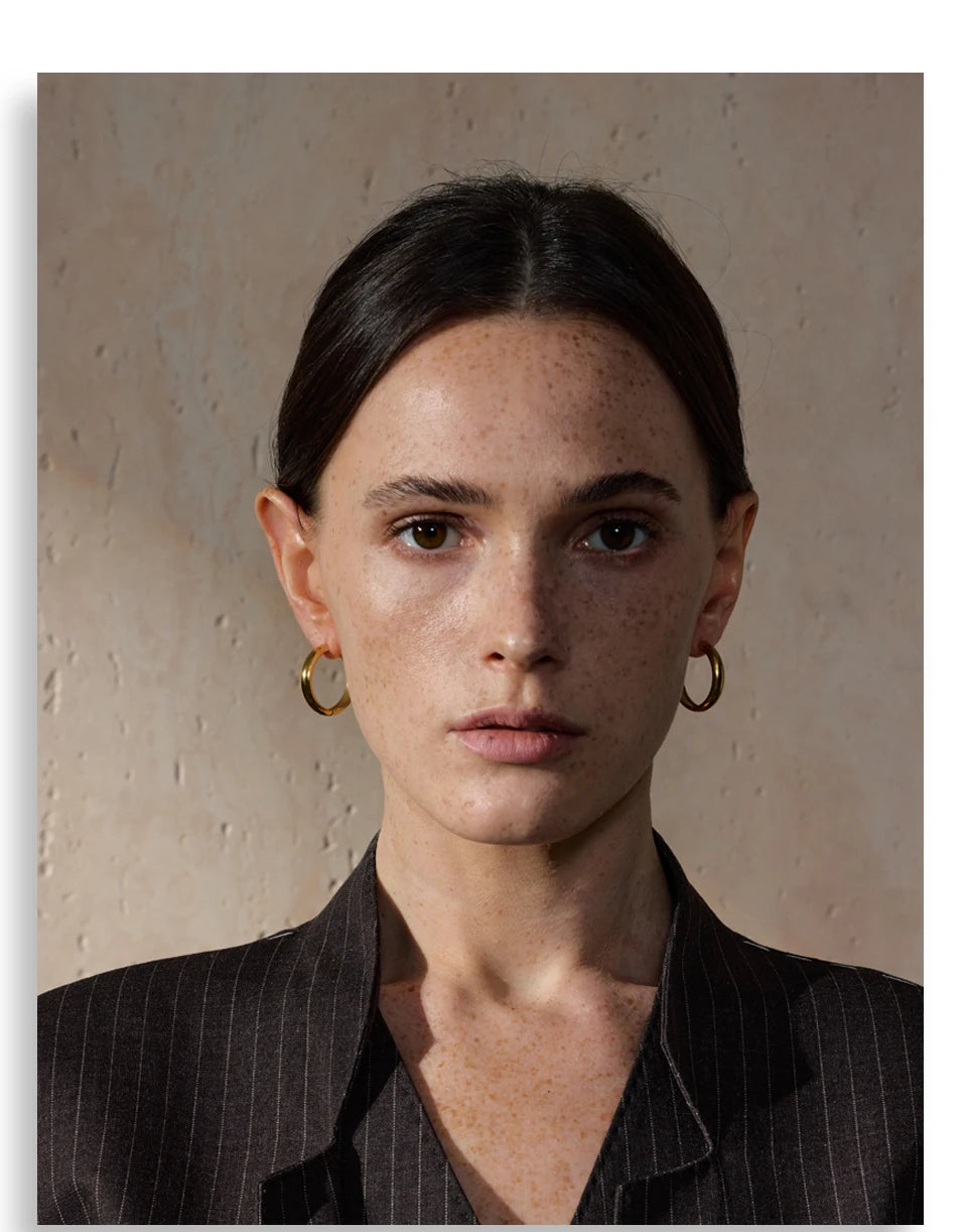 Geometric earrings in gold-plated stainless steel.
