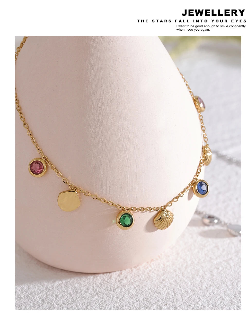 Cubic zirconia shell multi-color anklet in gold-plated stainless steel with cubic zirconia and shell.