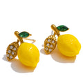 Cubic zirconia resin geometric earrings in gold-plated stainless steel with cubic zirconia and resin.