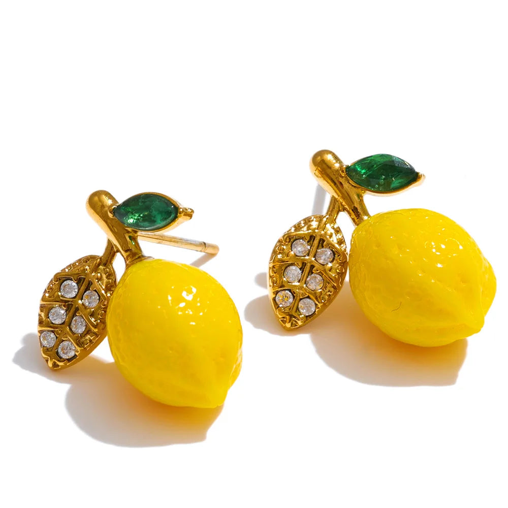 Cubic zirconia resin geometric earrings in gold-plated stainless steel with cubic zirconia and resin.