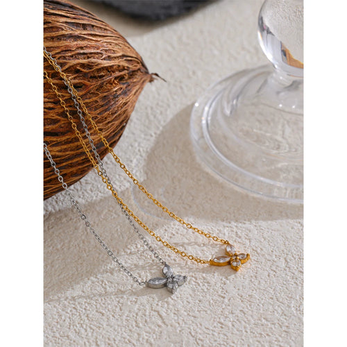 Cubic zirconia butterfly necklace in gold-plated stainless steel with cubic zirconia.