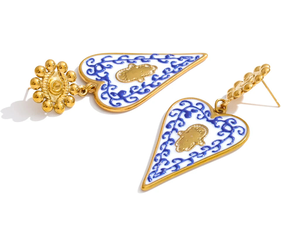 Blue enamel heart earrings in gold-plated stainless steel with enamel.