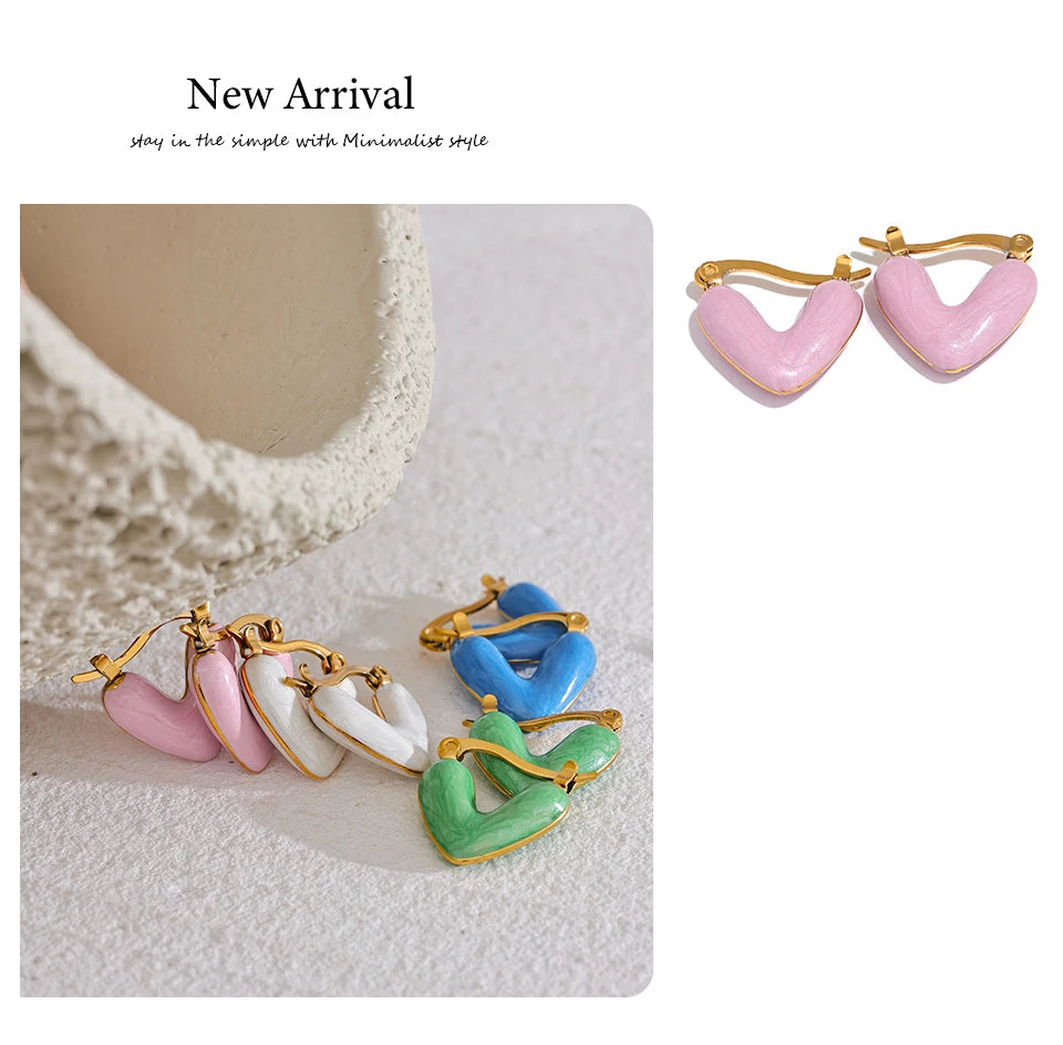 White enamel heart earrings in gold-plated stainless steel with enamel.