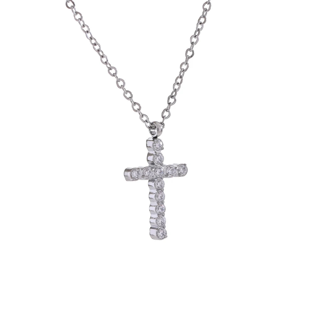 Cubic zirconia cross necklace in gold-plated 316L stainless steel with cubic zirconia.
