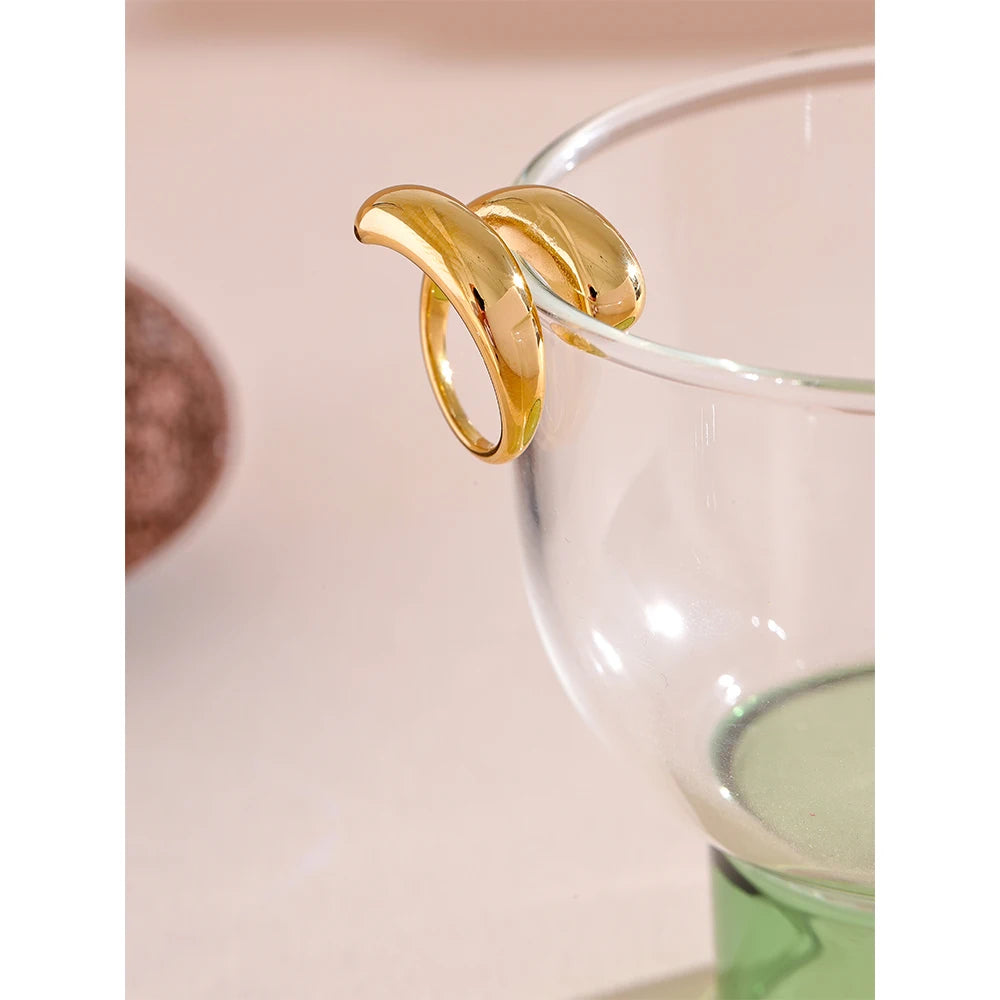 Geometric ring in 18K gold-plated stainless steel.