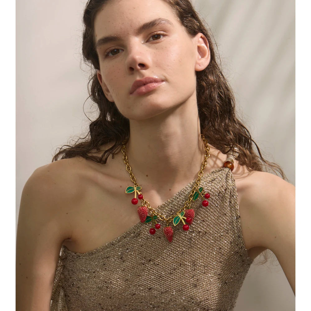 Red acrylic enamel necklace in gold-plated stainless steel with acrylic and enamel.