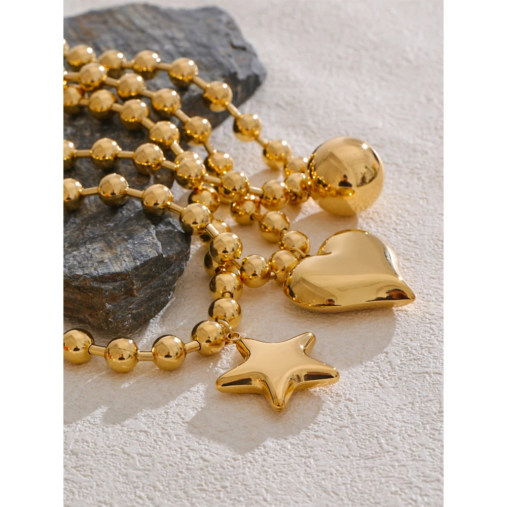 Heart star beaded necklace in gold-plated stainless steel.