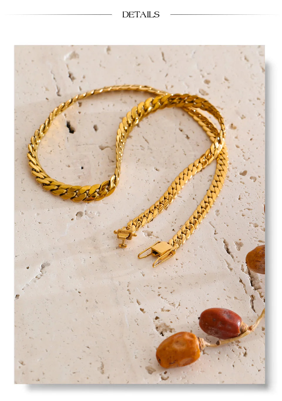Geometric chain necklace in gold-plated stainless steel.