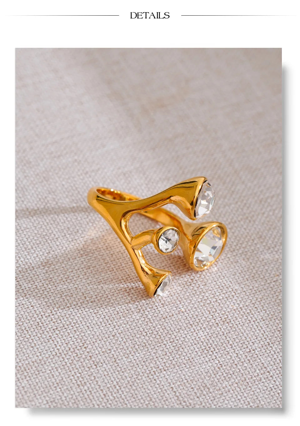 Crystal geometric ring in 18K gold-plated stainless steel with crystal.
