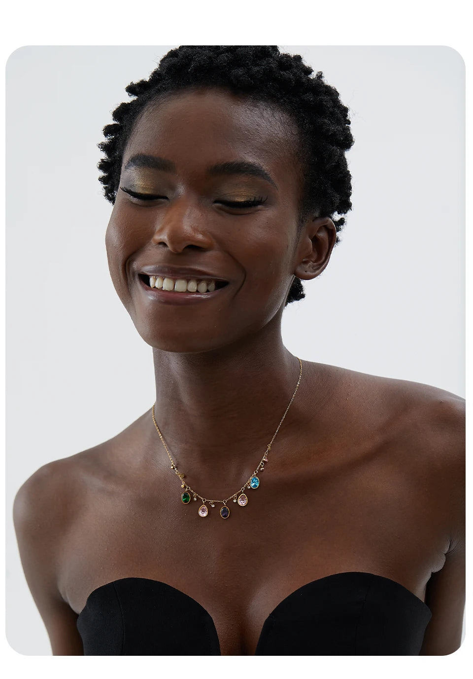 Cubic zirconia multi-color geometric necklace in gold-plated stainless steel with cubic zirconia.