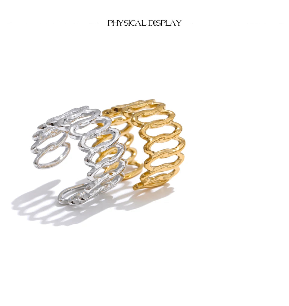 Geometric ring in gold-plated stainless steel.