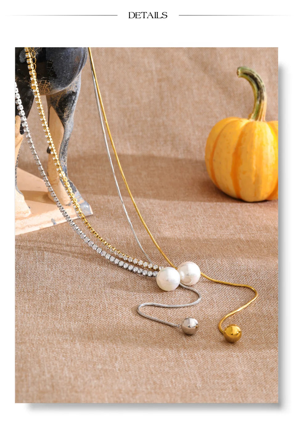 Cubic zirconia pearl geometric necklace in gold-plated stainless steel with pearl and cubic zirconia.