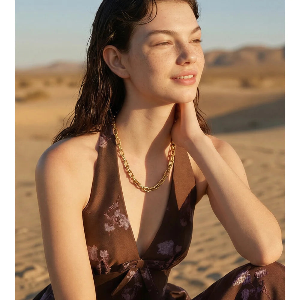 Geometric chain necklace in gold-plated stainless steel.