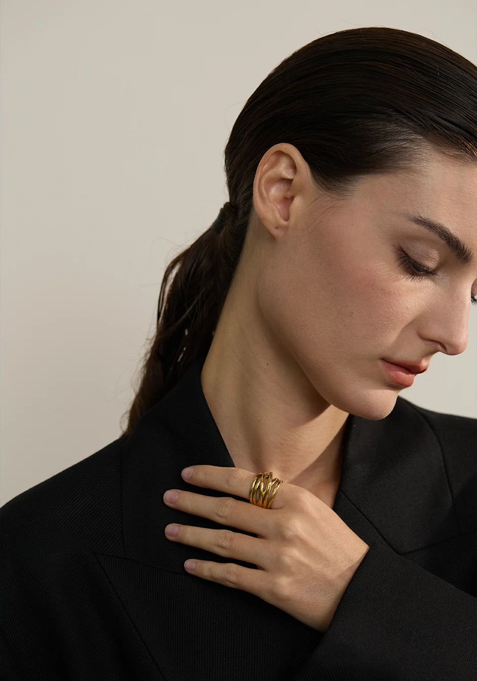 Geometric ring in 18K gold-plated stainless steel.