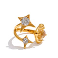 Cubic zirconia geometric ring in 18K gold-plated stainless steel with cubic zirconia.
