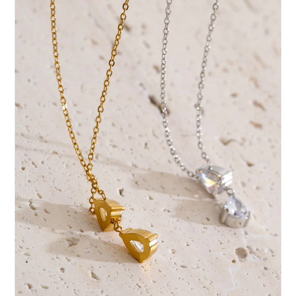 Cubic zirconia geometric necklace in gold-plated stainless steel with cubic zirconia.