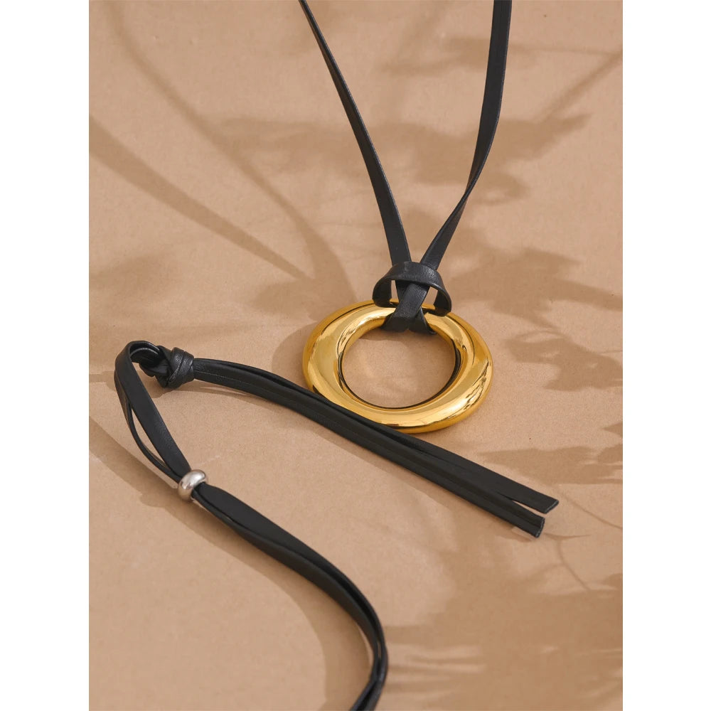 Coin geometric necklace in gold-plated stainless steel.