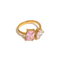 White cubic zirconia geometric ring in 18K gold-plated stainless steel with cubic zirconia.