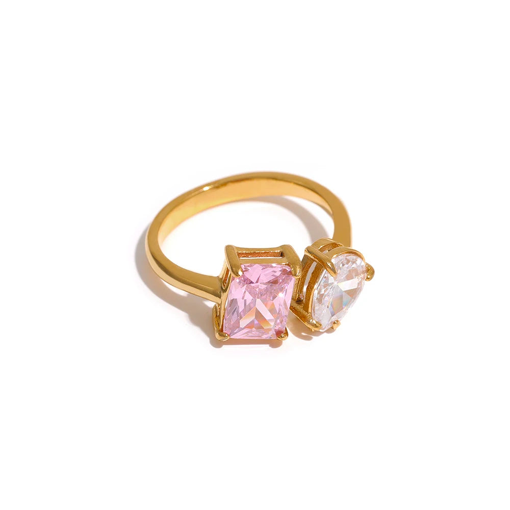 White cubic zirconia geometric ring in 18K gold-plated stainless steel with cubic zirconia.