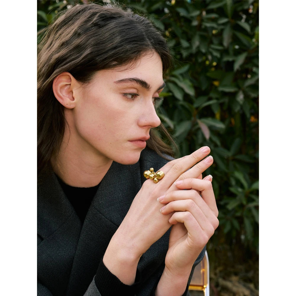 Beaded geometric ring in 18K gold-plated stainless steel.