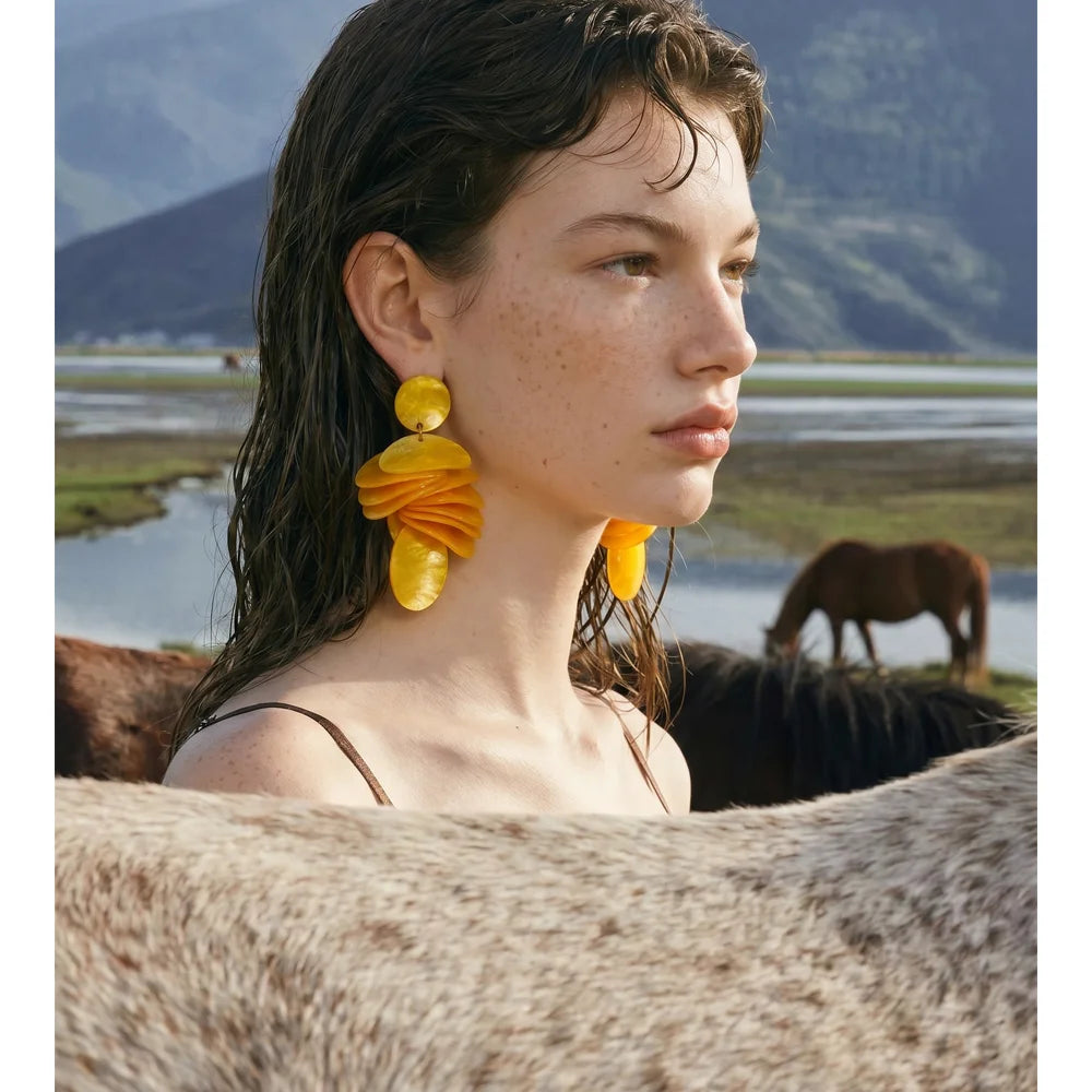 Green acrylic geometric earrings in gold-plated stainless steel with acrylic.