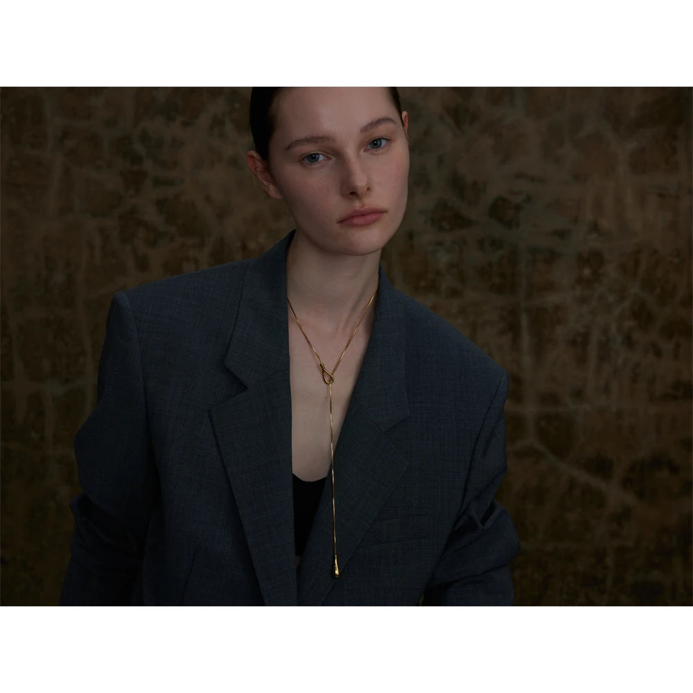 Geometric chain necklace in gold-plated 316L stainless steel.