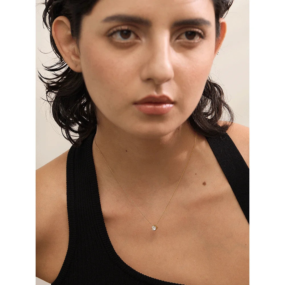 Cubic zirconia geometric necklace in gold-plated stainless steel with cubic zirconia.