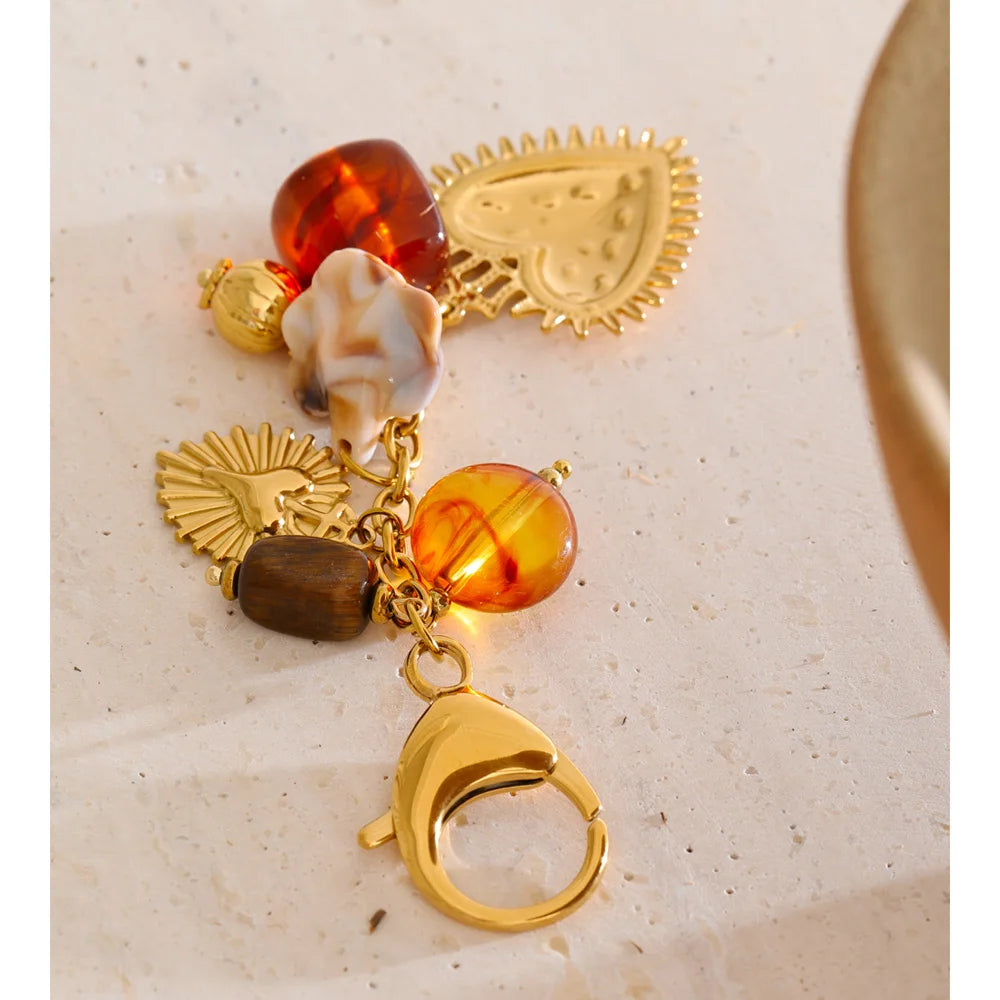 Resin heart chain necklace in gold-plated stainless steel with resin.