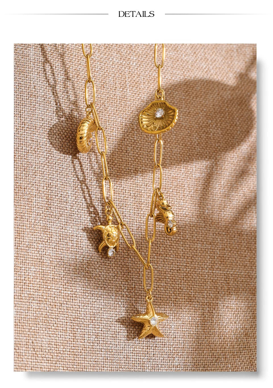 Cubic zirconia shell star necklace in gold-plated stainless steel with cubic zirconia and shell.
