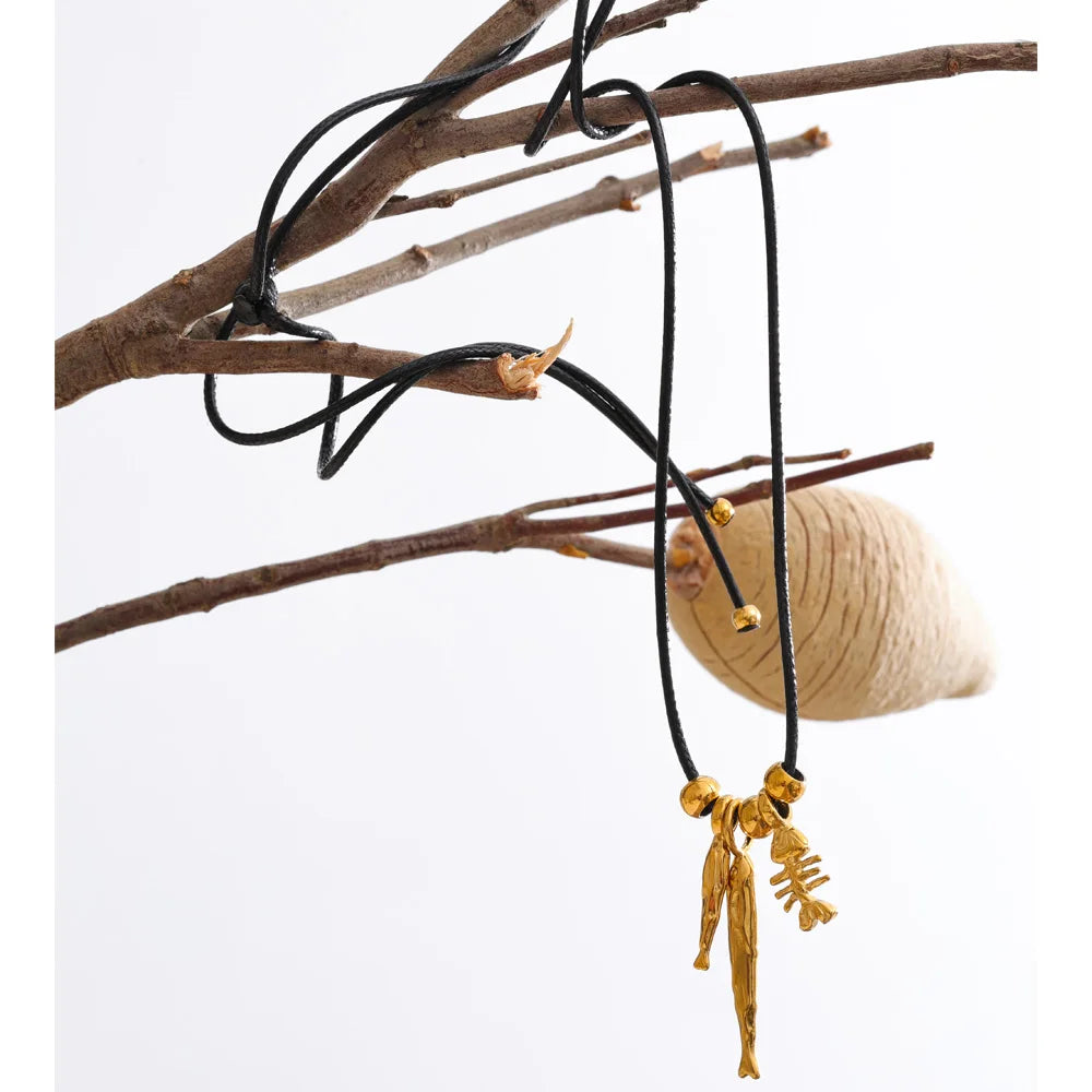 Geometric chain necklace in gold-plated stainless steel.