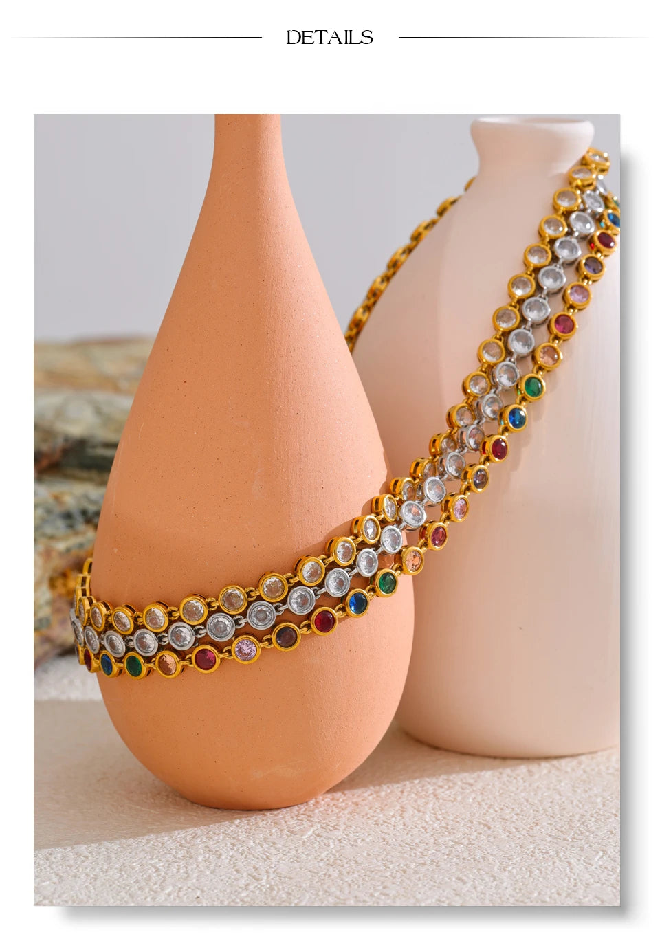 Cubic zirconia multi-color geometric necklace in gold-plated stainless steel with cubic zirconia.