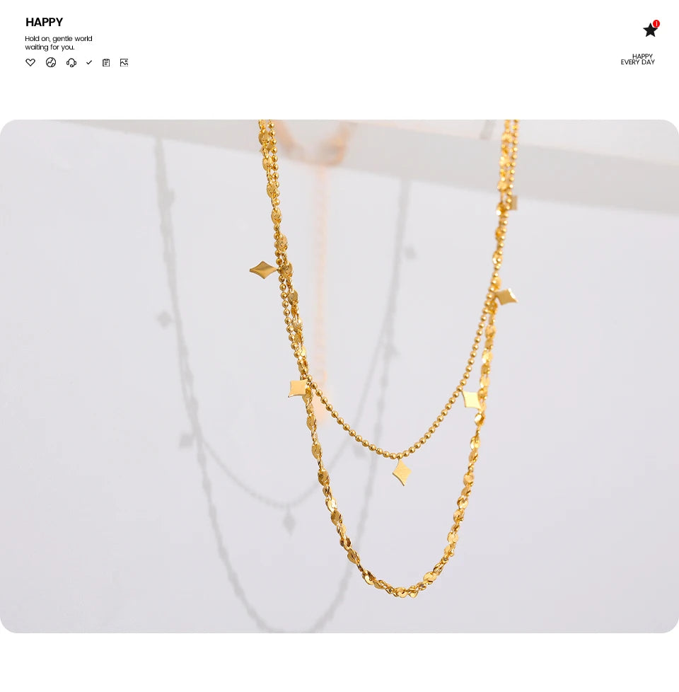 Geometric chain layered necklace in gold-plated stainless steel.