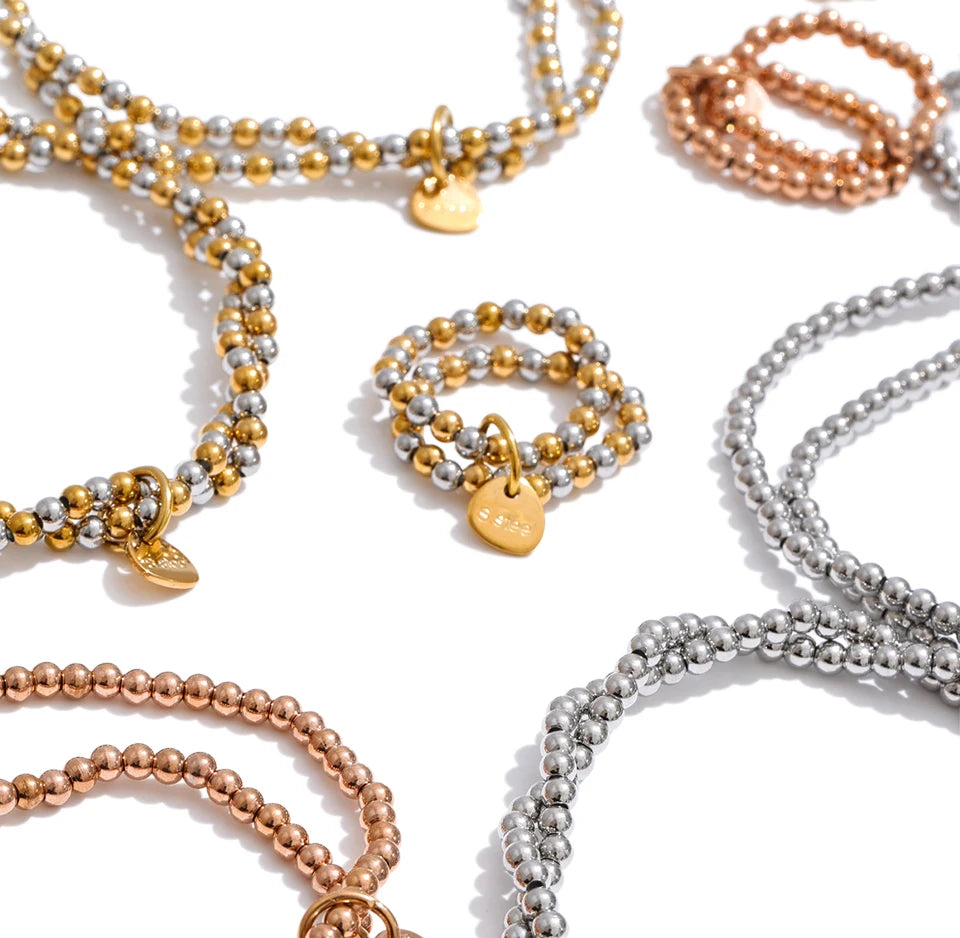 Beaded geometric bracelet in gold-plated stainless steel.