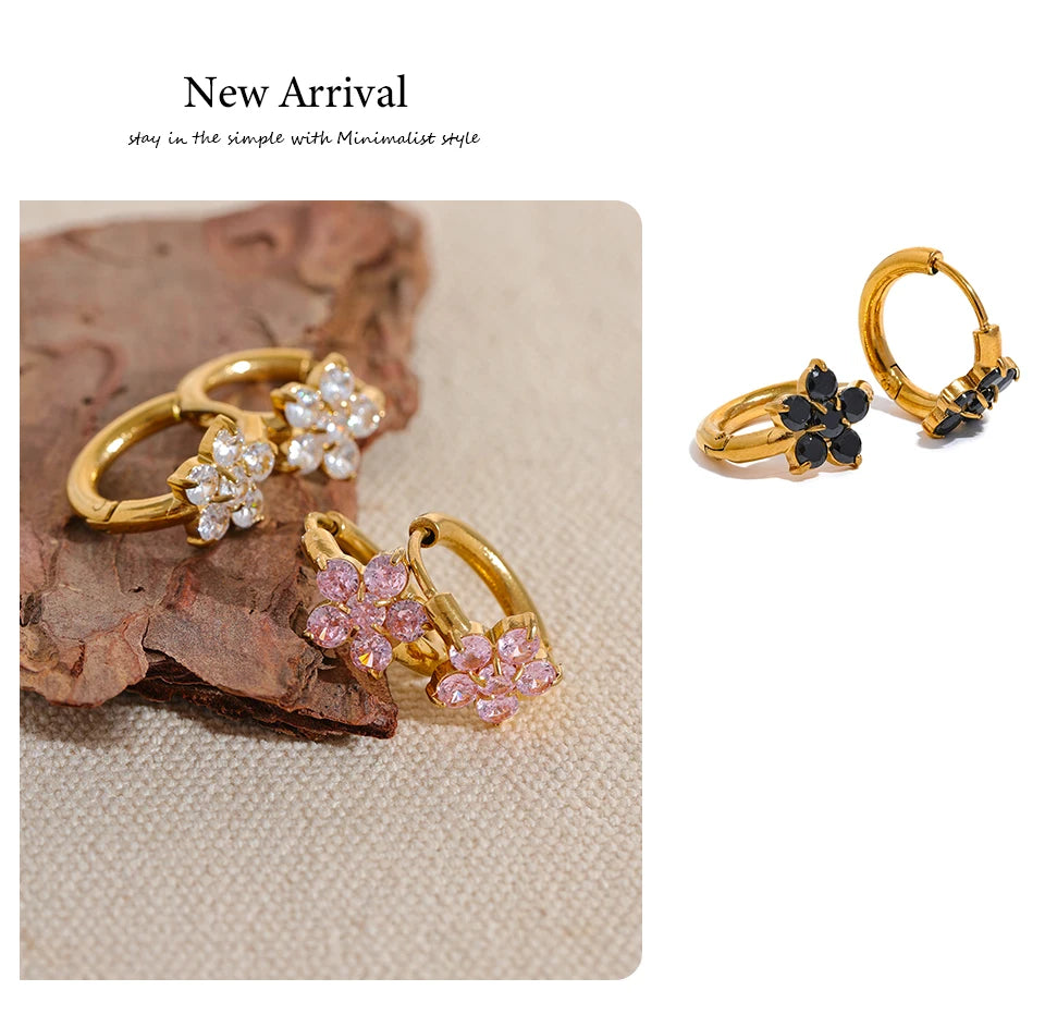 Cubic zirconia flower earrings in gold-plated stainless steel with cubic zirconia.
