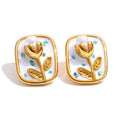 Pearl enamel flower earrings in gold-plated stainless steel with pearl and enamel.
