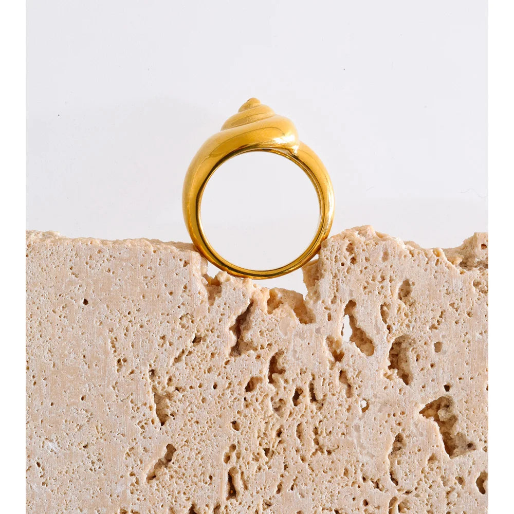 Geometric ring in 18K gold-plated stainless steel.