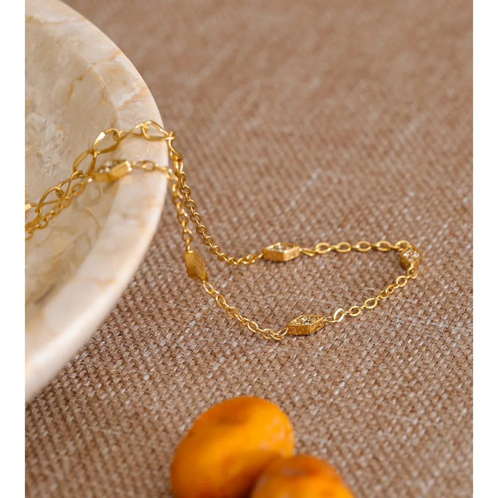 Cubic Zirconia Geometric Chain Bracelet — Gold-Plated Stainless Steel with Cubic Zirconia · PS1039