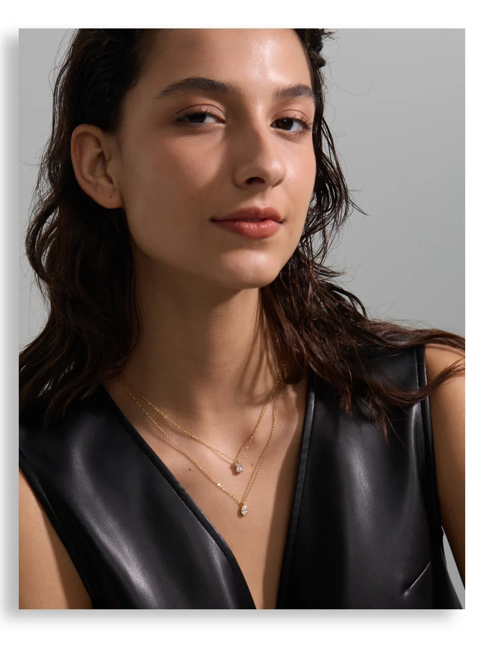 Cubic zirconia geometric layered necklace in gold-plated stainless steel with cubic zirconia.