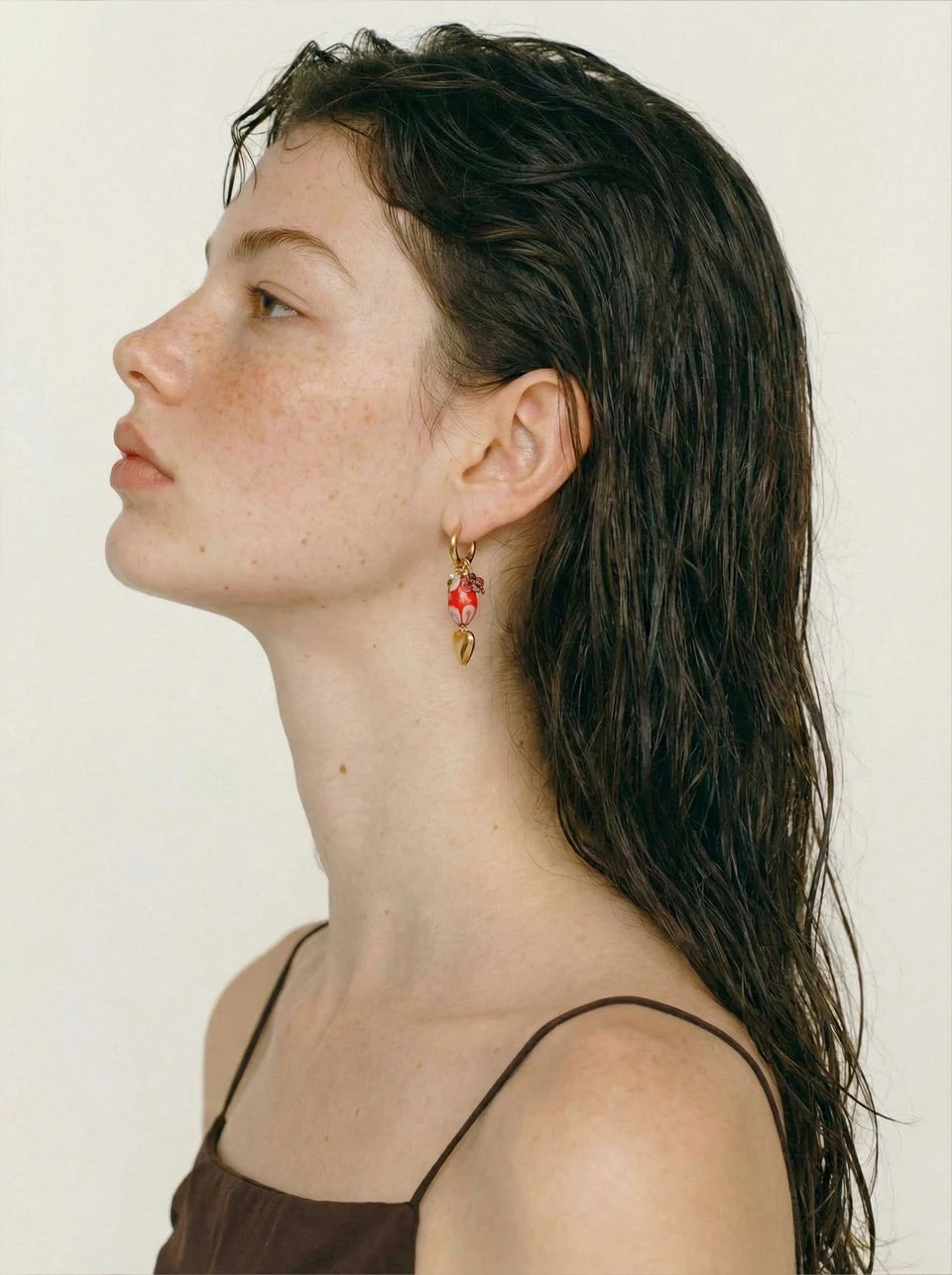 Red heart earrings in gold-plated stainless steel.