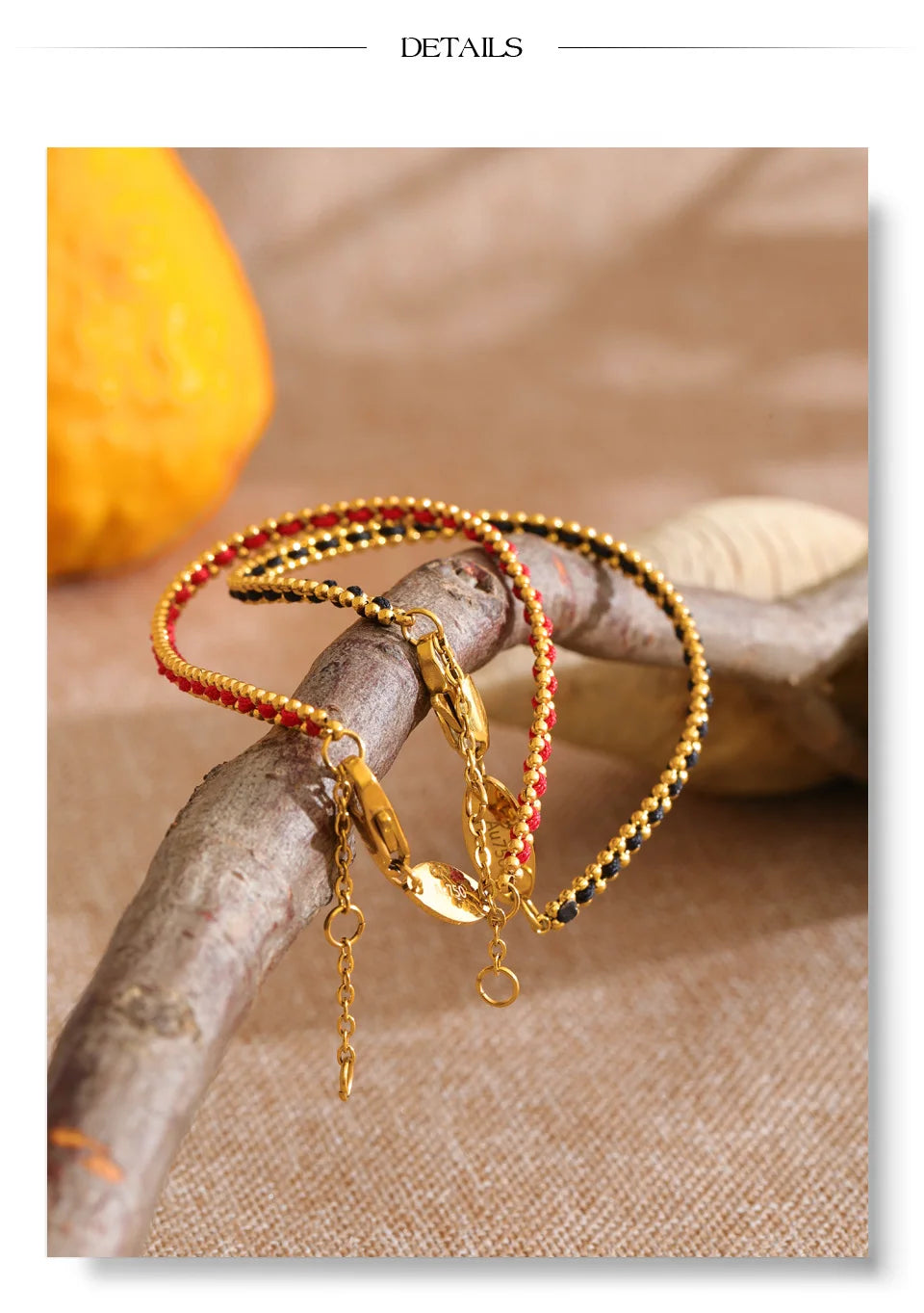 Black geometric chain necklace in gold-plated stainless steel.