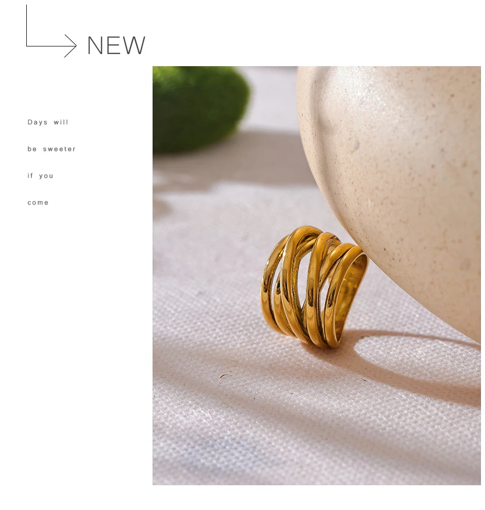 Geometric ring in 18K gold-plated stainless steel.