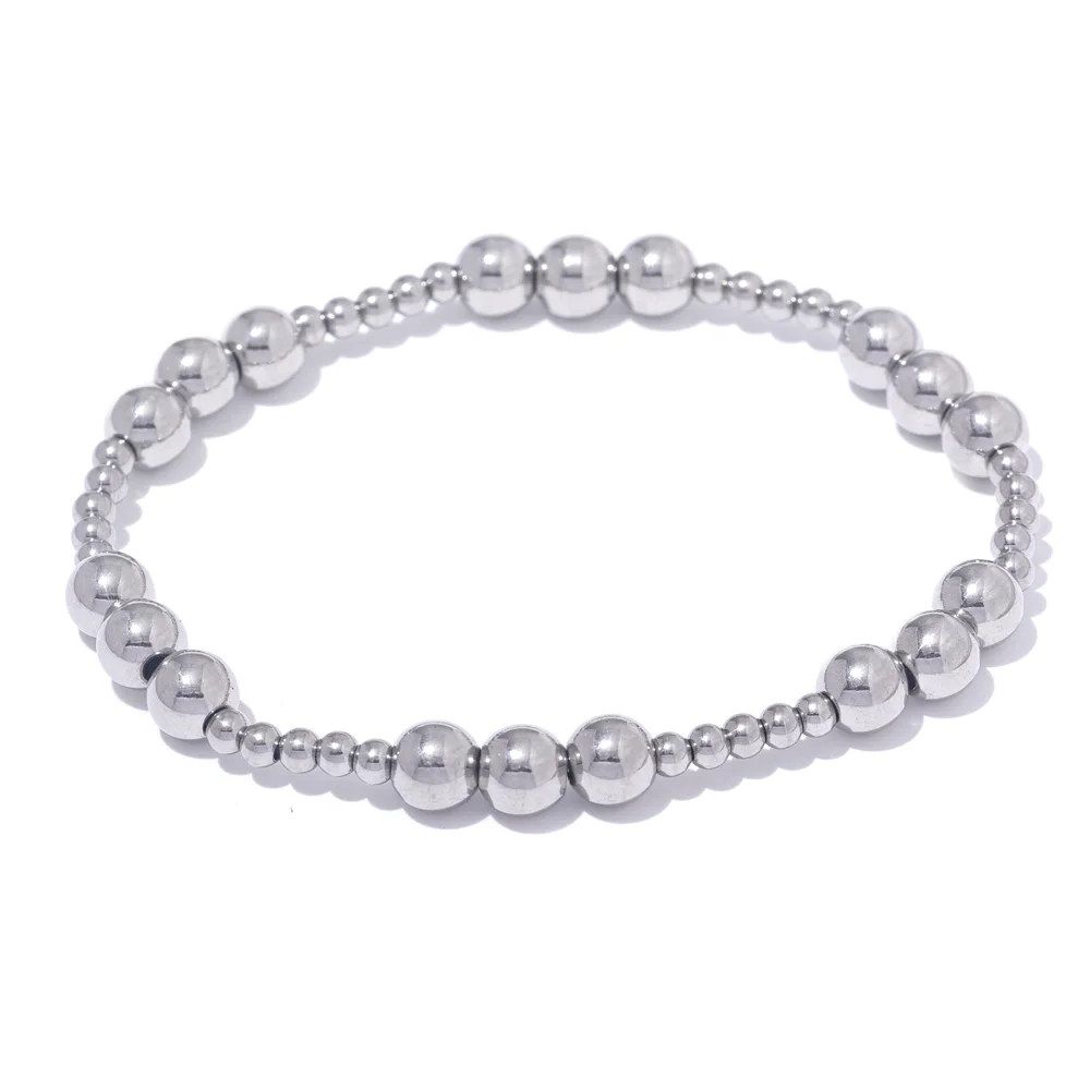Beaded geometric bracelet in gold-plated stainless steel.