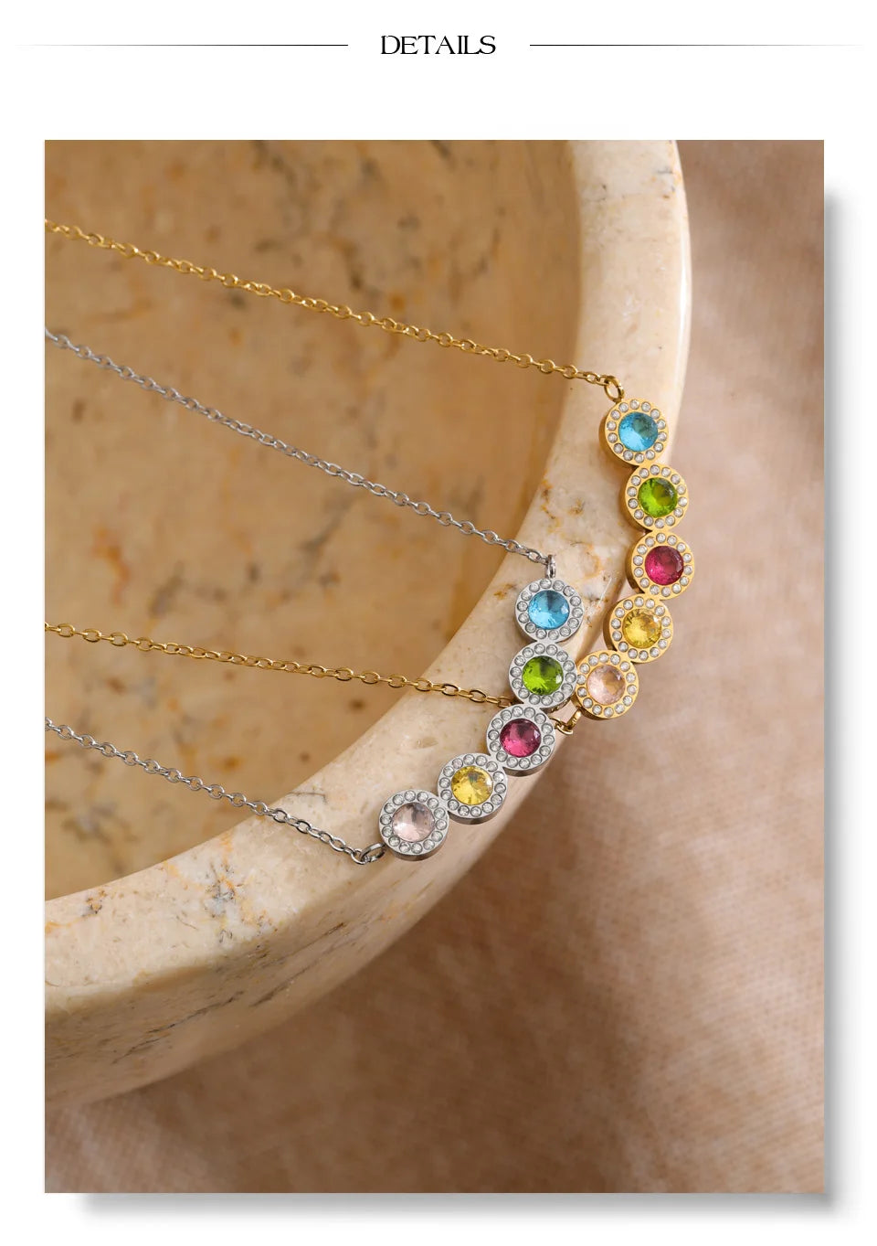 Cubic zirconia multi-color geometric necklace in gold-plated stainless steel with cubic zirconia.