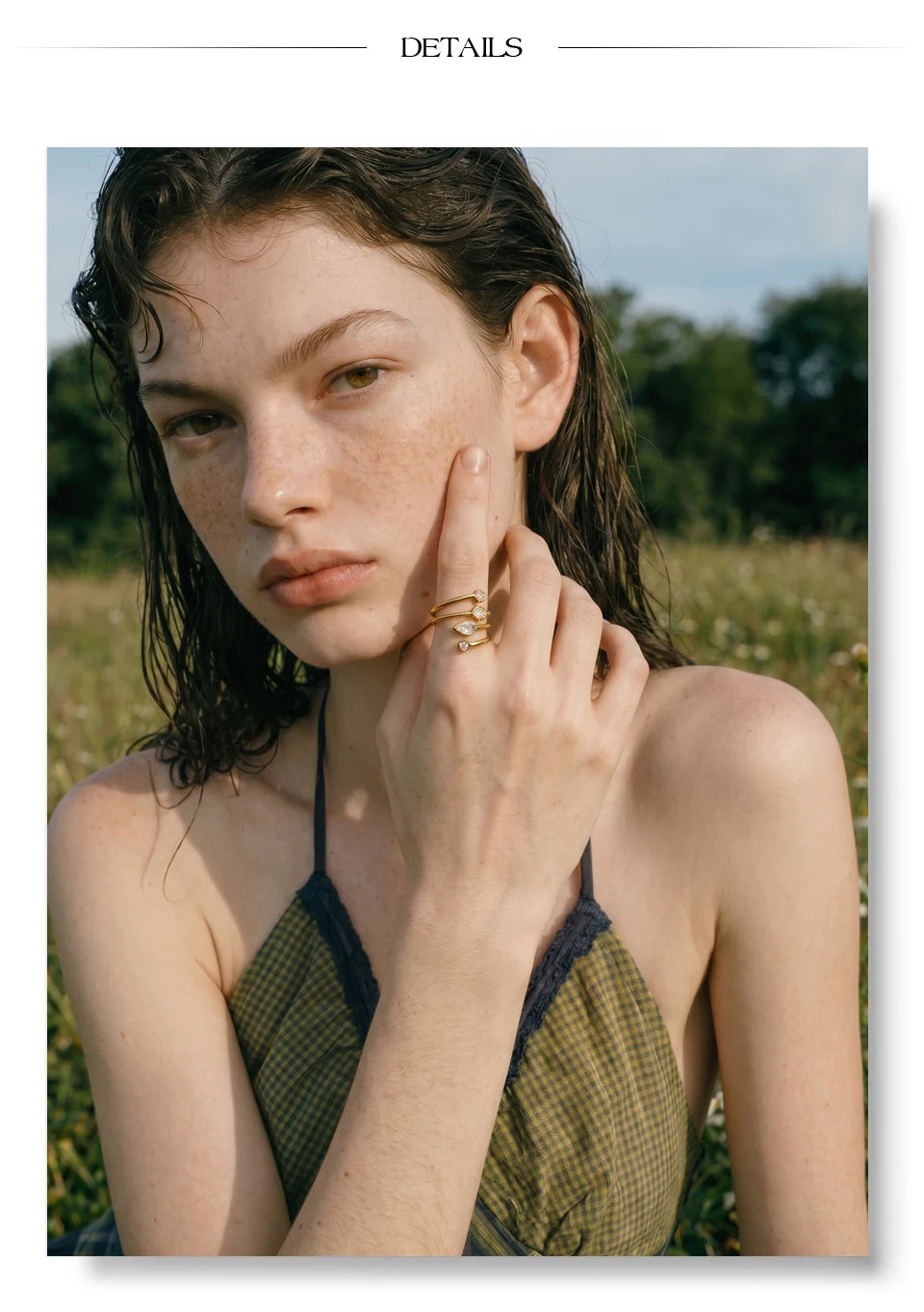Cubic zirconia geometric layered ring in 18K gold-plated stainless steel with cubic zirconia.