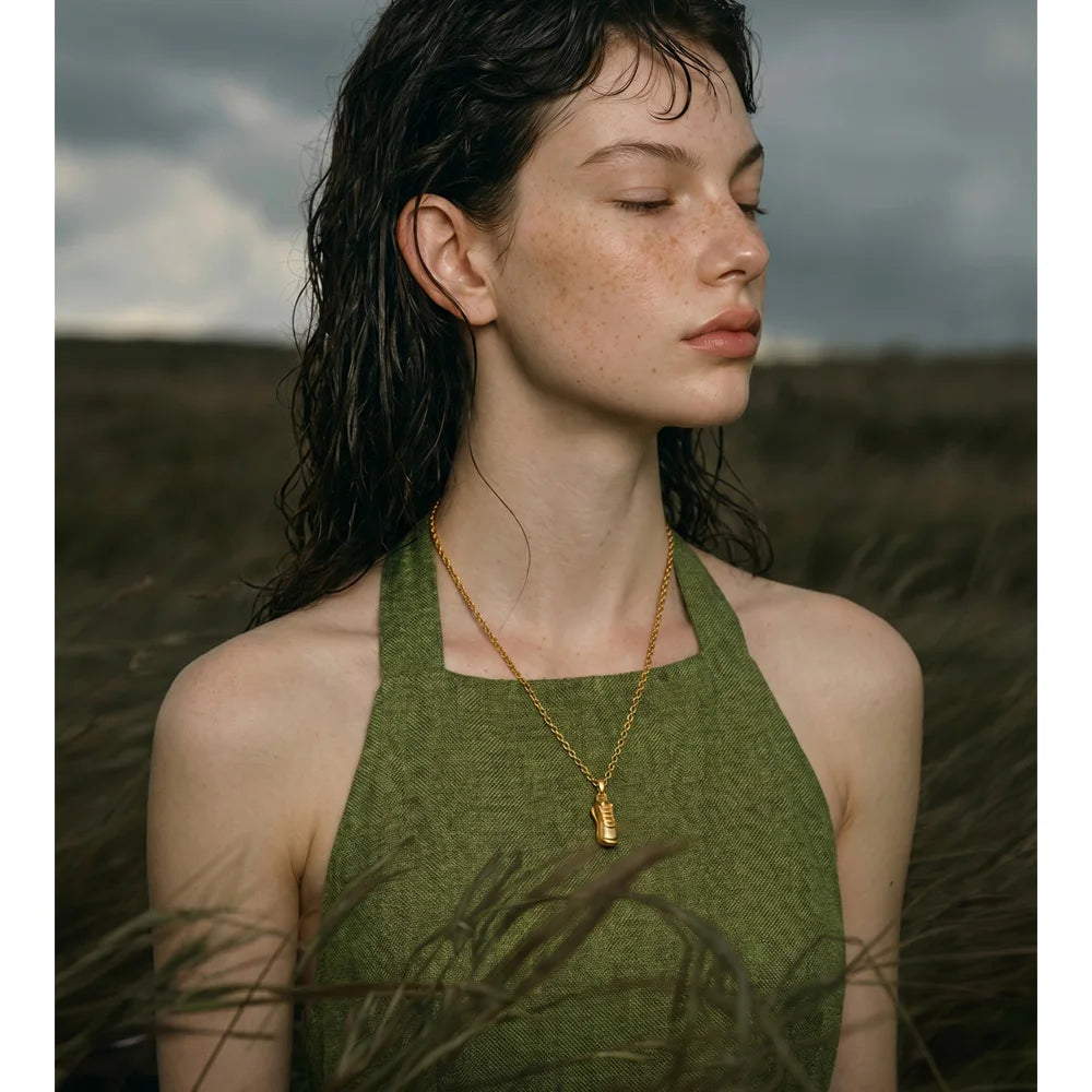 Geometric necklace in gold-plated stainless steel.